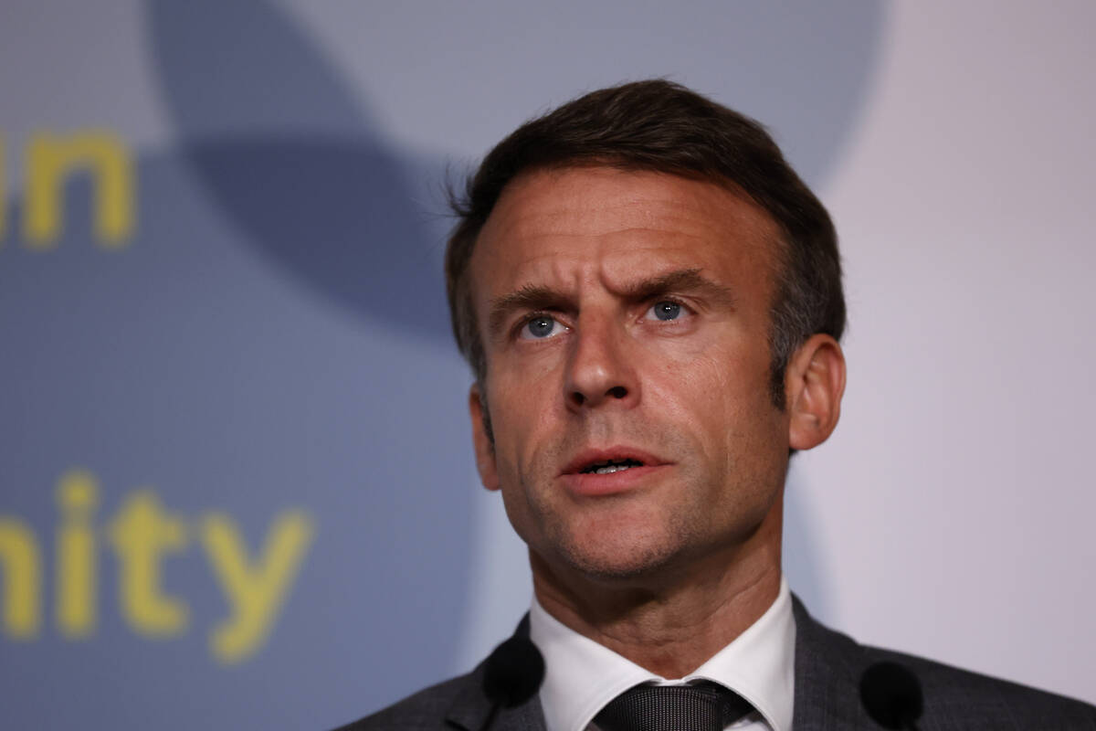 FILE - France President Emmanuel Macron speaks during a press conference at the Europe Summit i ...