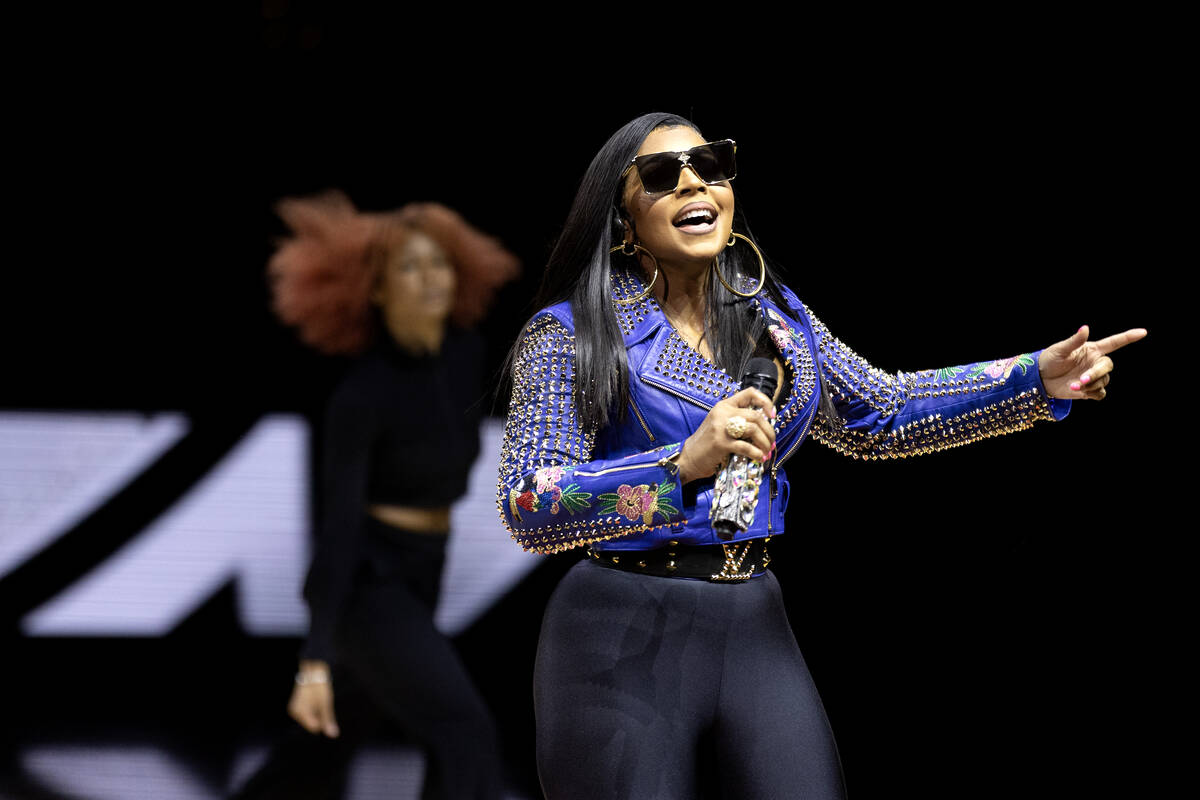 Ashanti performs during halftime in Game 1 of a WNBA basketball final series between the Las Ve ...