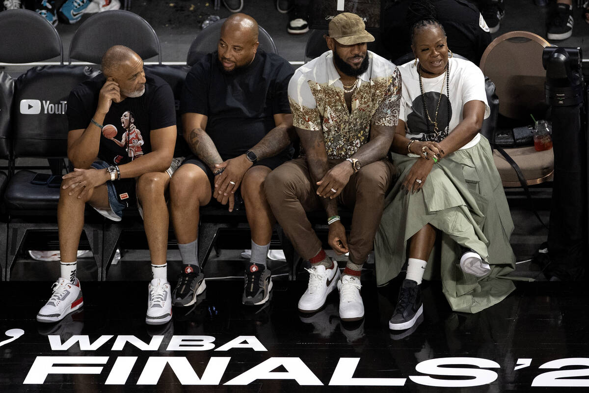NBA superstar Lebron James, center right, and former WNBA player Sheryl Swoopes, right, attend ...