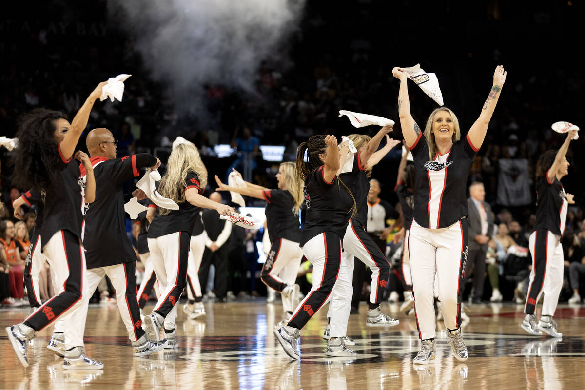 The High Rollers dance team performs during the second half in Game 1 of a WNBA basketball fina ...
