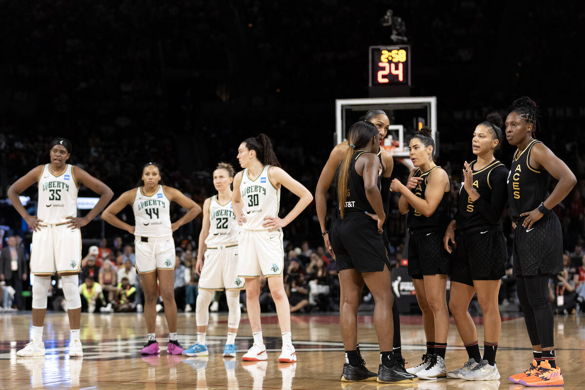 The Las Vegas Aces communicate while the New York Liberty shoot a free throw during the second ...