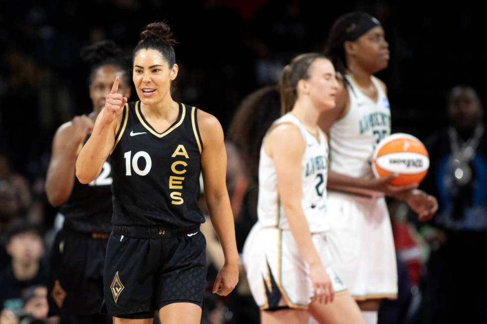 Las Vegas Aces guard Kelsey Plum (10) celebrates after the New York Liberty were charged with a ...