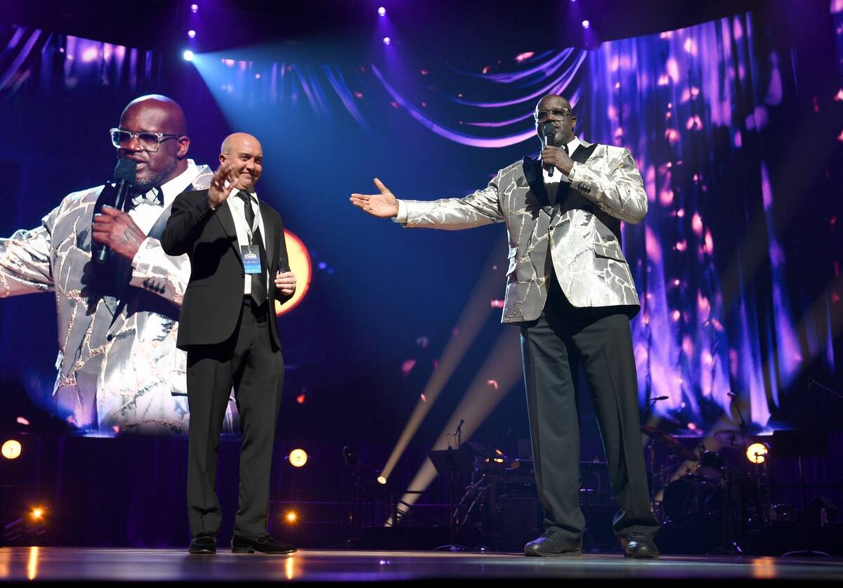 Perry Rogers, left, and Shaquille O'Neal speak onstage during The Event hosted by the Shaquille ...