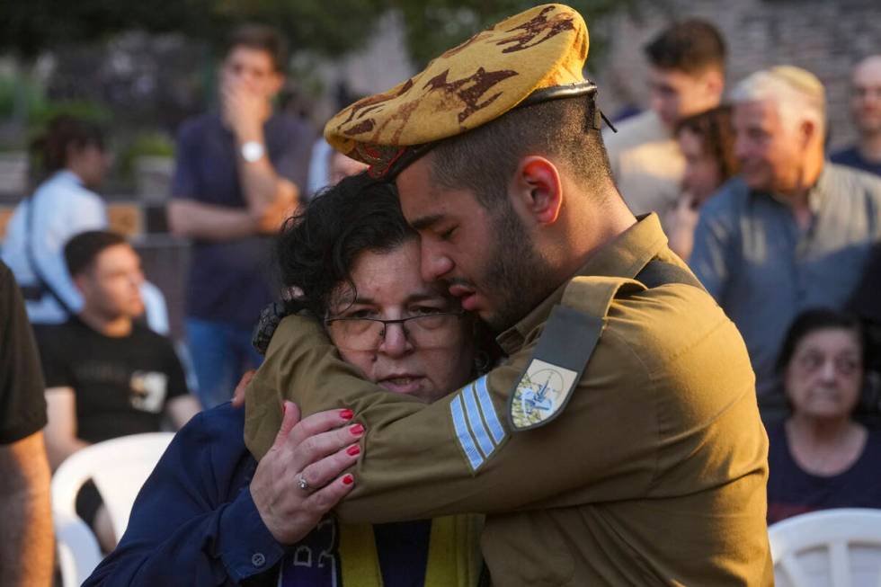 Friends and relatives of Ilai Bar Sade mourn during his funeral at the military cemetery in Tel ...