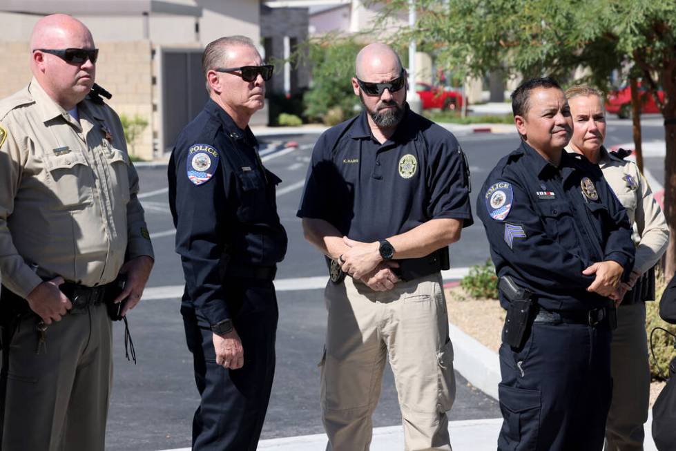 Members of the law enforcement community listen as Erin Breen, director of Road Equity Alliance ...