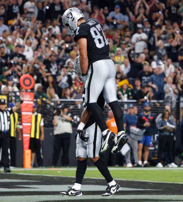 Raiders wide receiver Jakobi Meyers (16) and tight end Michael Mayer (87) celebrate after Meyer ...