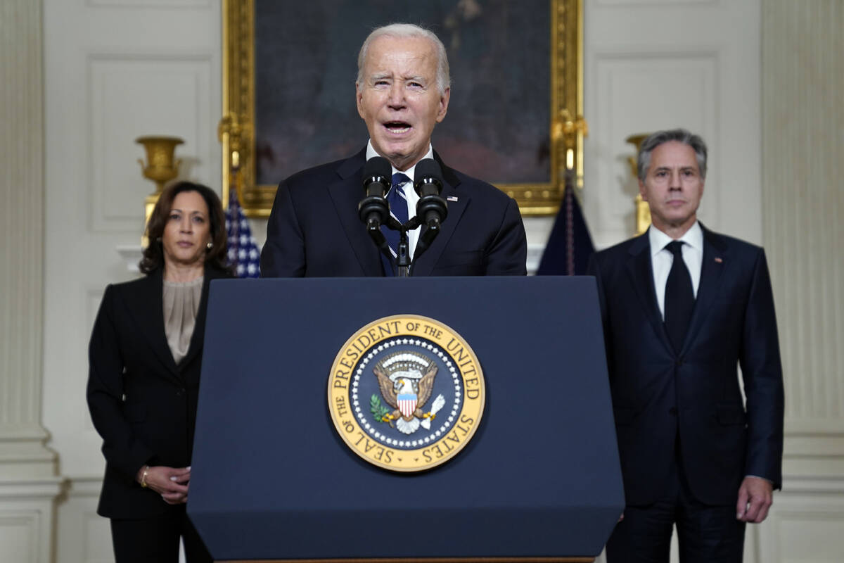 President Joe Biden speaks Tuesday, Oct. 10, 2023, in the State Dining Room of the White House ...