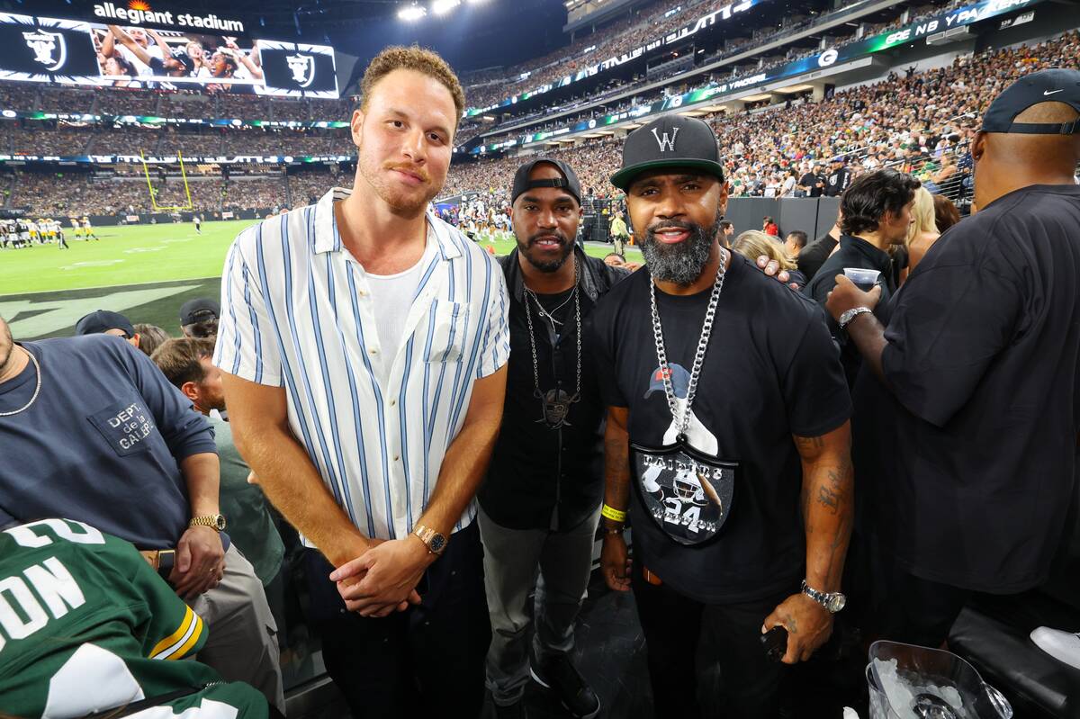 Boston Celtics forward Blake Griffin and former Raiders star Charles Woodson are shown during W ...