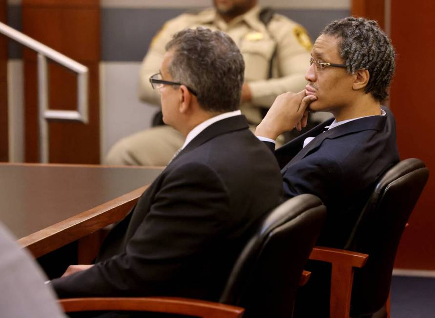 Omar Talley, accused of killing two women near the Strip, listens as the jury is polled the cou ...