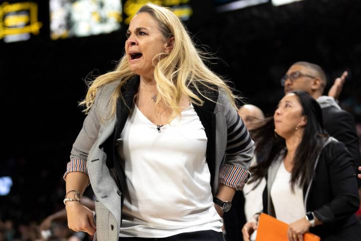 Las Vegas Aces head coach Becky Hammon reacts after referees didn’t call a foul on the N ...