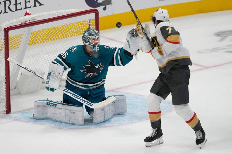 Vegas Golden Knights defenseman Alex Pietrangelo (7) reacts after being hit by the puck on the ...