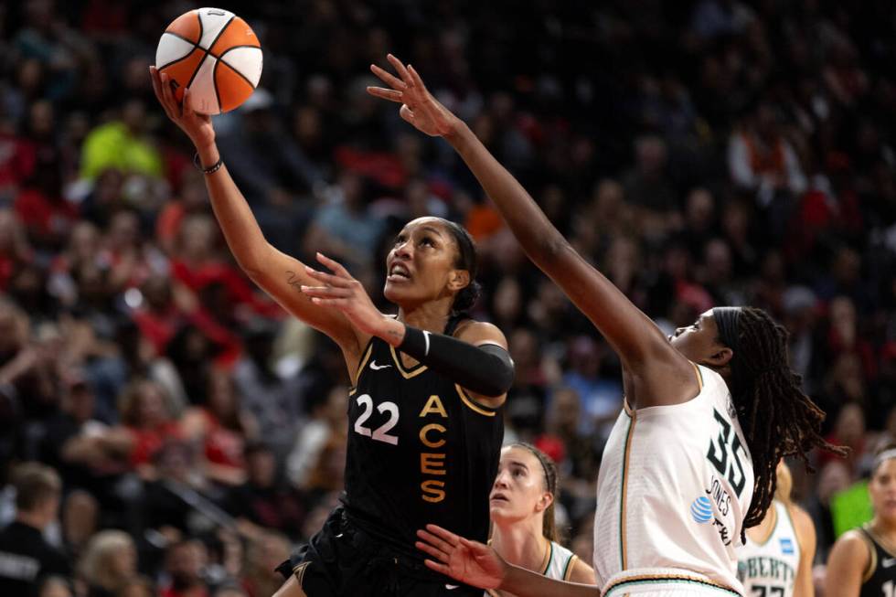 Las Vegas Aces forward A'ja Wilson (22) shoots against New York Liberty forward Jonquel Jones ( ...