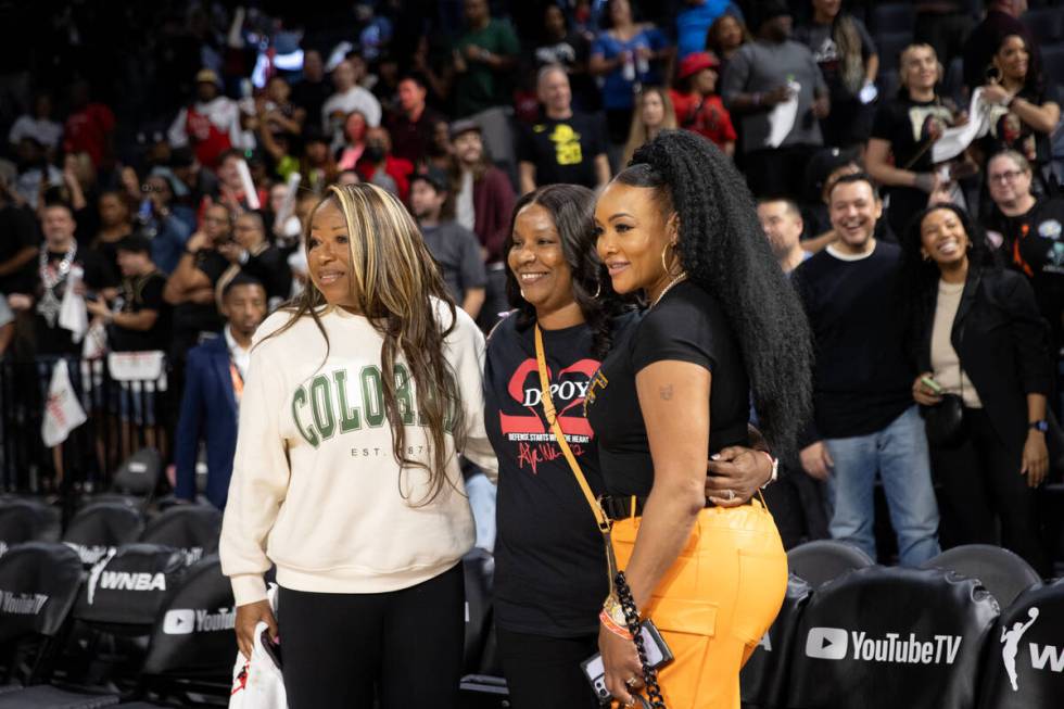 Former WNBA player Cynthia Cooper-Dyke, left, A’ja Wilson’s mother Eva Wilson and ...