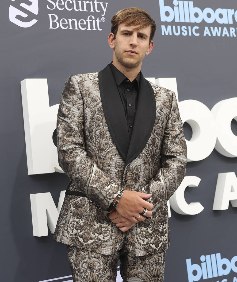 DJ Illenium poses on the red carpet for the Billboard Music Awards at the MGM Grand Garden Aren ...