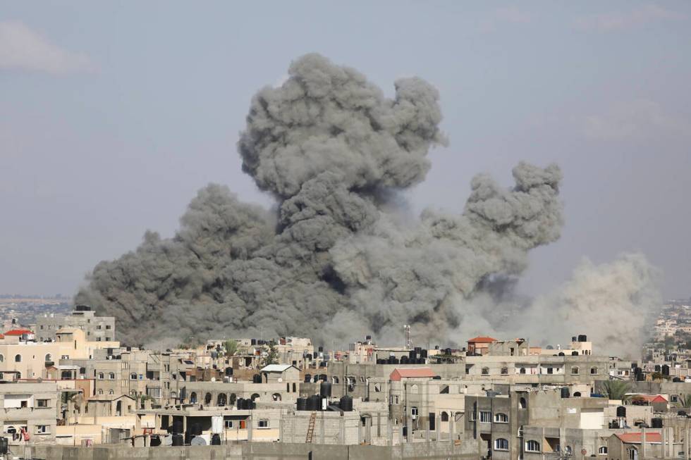 Smoke rises following Israeli airstrikes in Rafah, southern Gaza Strip on Thursday, Oct. 12, 20 ...