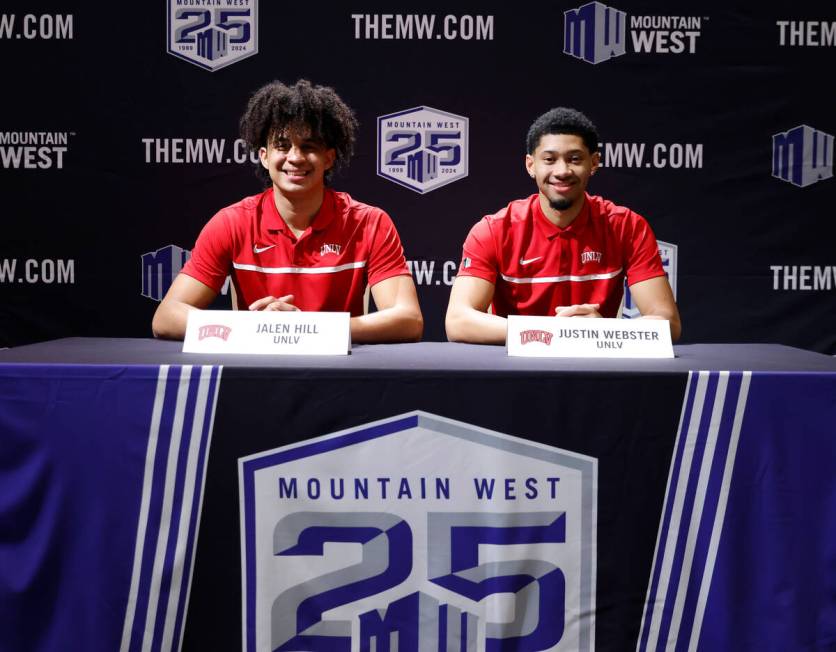 UNLV Rebels forward Jalen Hill, left, and guard Justin Webster pose for a photo before addressi ...