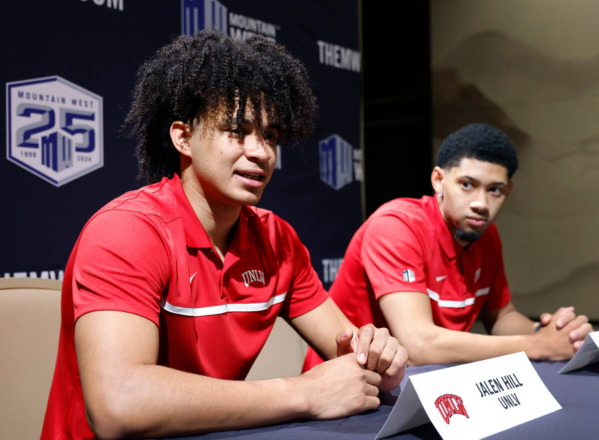 UNLV Rebels forward Jalen Hill, left, speaks as guard Justin Webster looks on during Mountain W ...