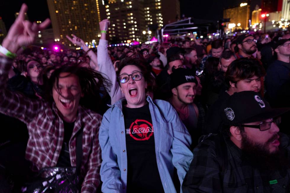 A group of fans dances to Alkaline Trio’s set during When We Were Young music festival a ...