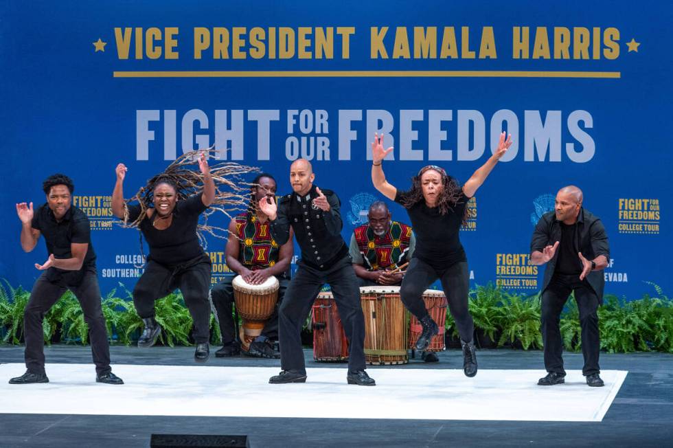 A West African dance and step team performs for the crowd before Vice President Kamala Harris s ...