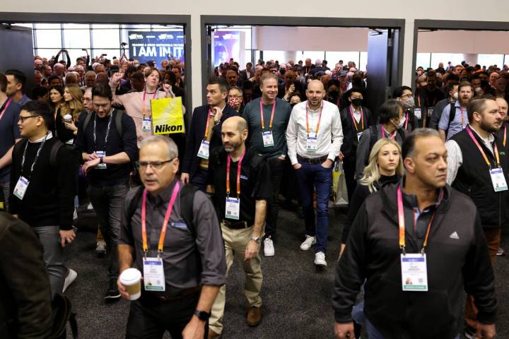 Conventioneers file onto the show floor for CES at Venetian Expo in Las Vegas Thursday, Jan. 4, ...