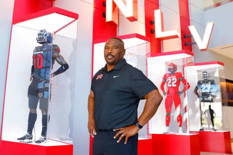 Former Rebel Hunkie Cooper, now a member of the staff, poses for a photo at Fertitta Football C ...