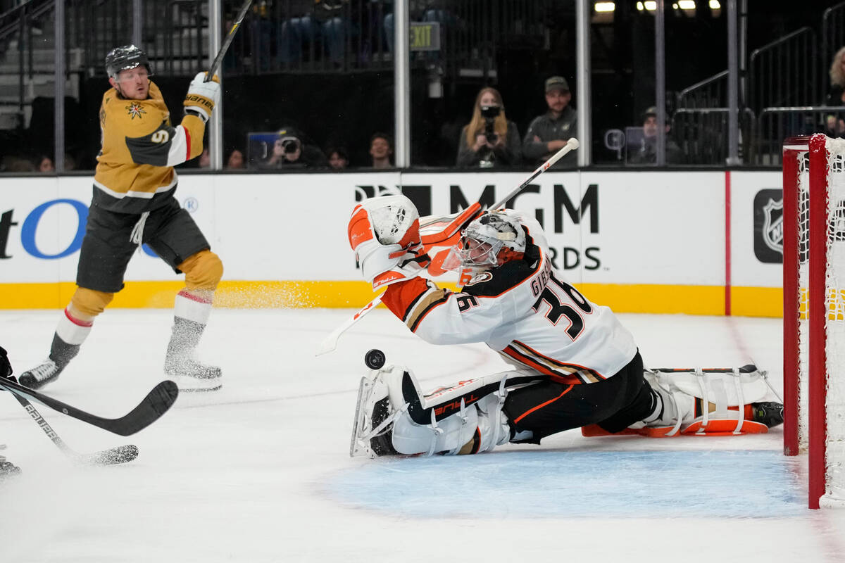 Anaheim Ducks goaltender John Gibson (36) blocks a shot by Vegas Golden Knights center Jack Eic ...