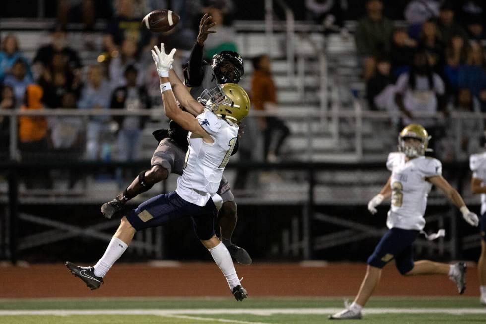 Faith Lutheran’s Wandley Wilson (23) breaks up a pass intended for Foothill wide receive ...