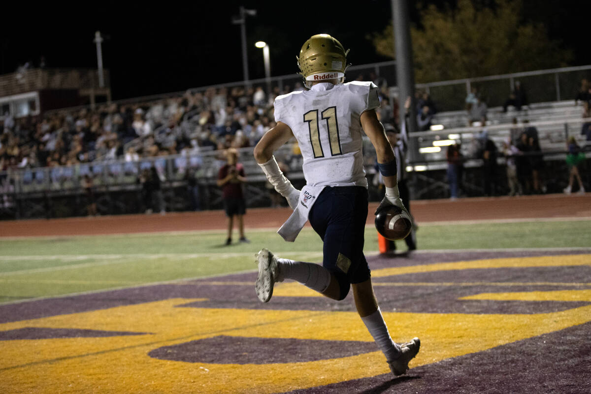 Foothill wide receiver Devon Wake (11) scores a touchdown during the second half of a high scho ...