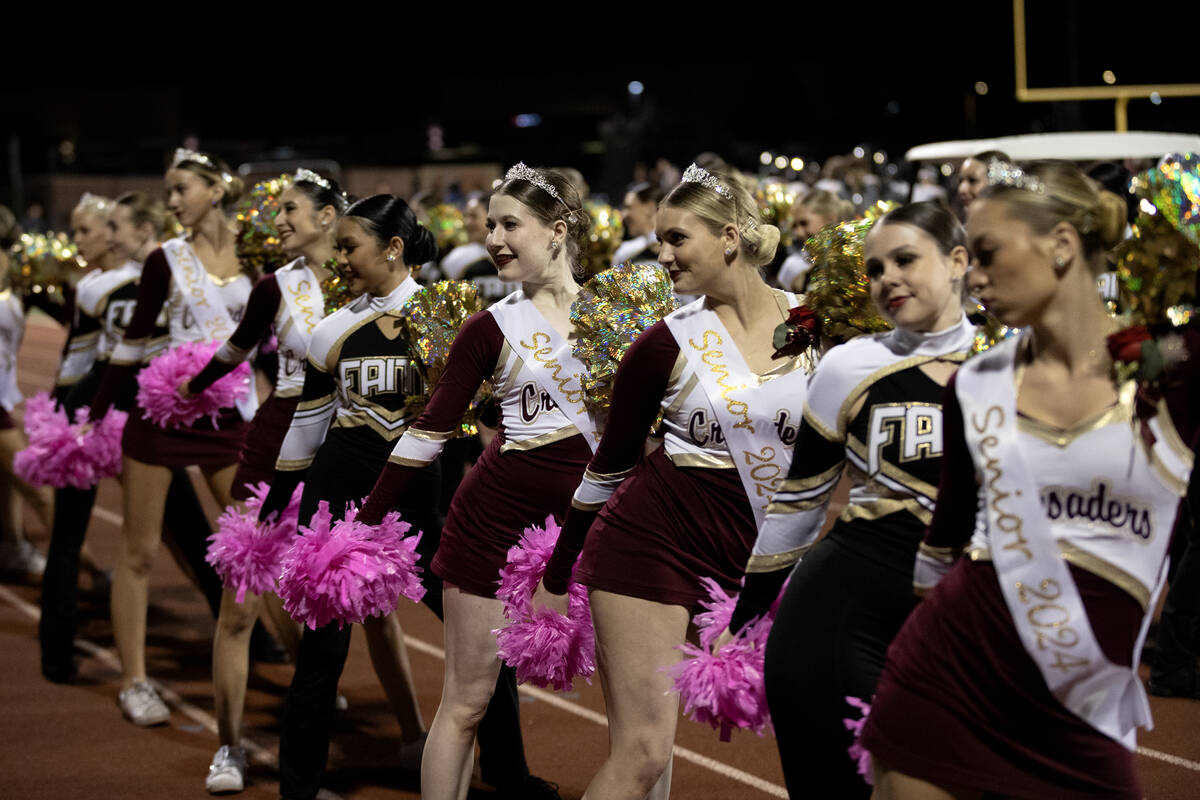 Faith Lutheran’s cheerleaders perform during the second half of a high school football g ...