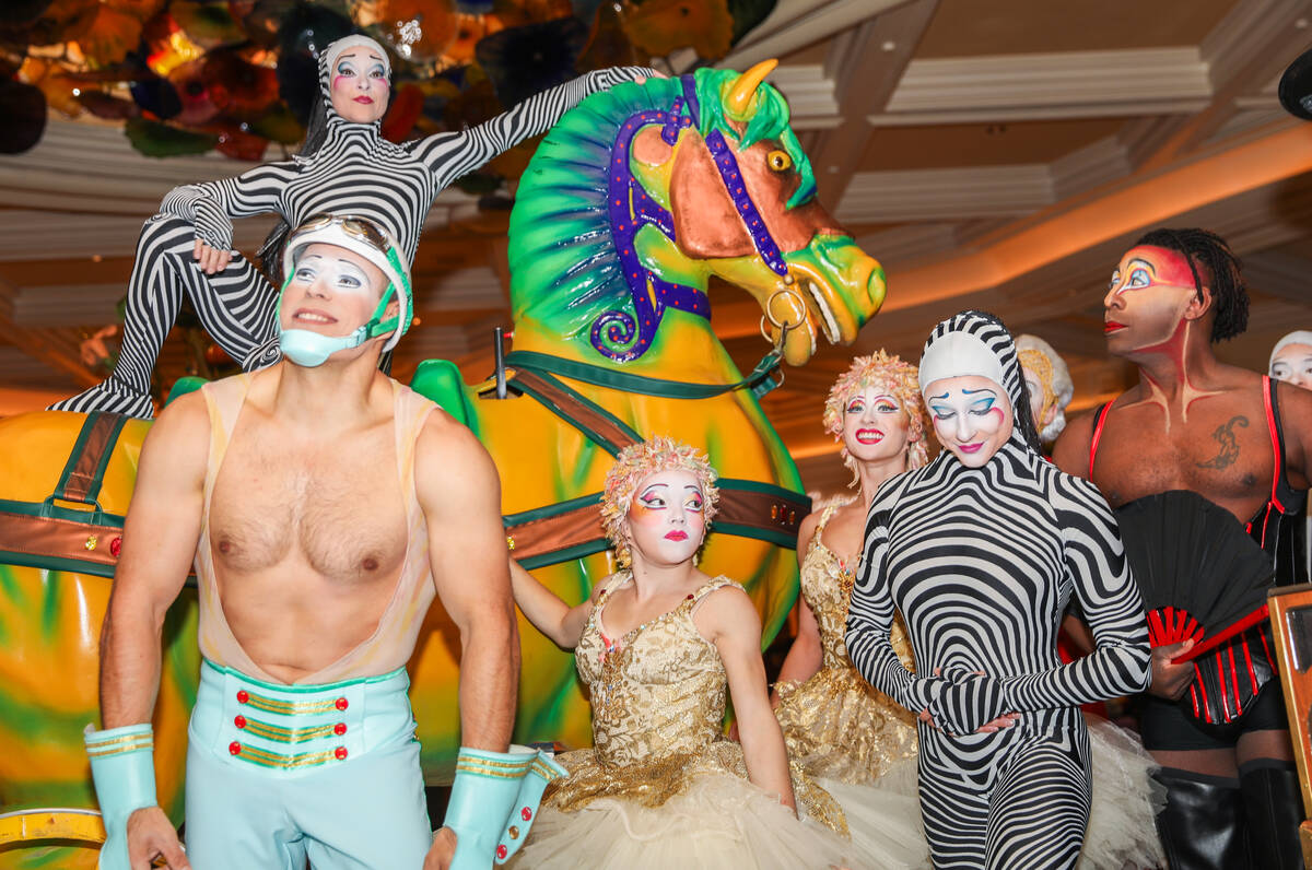 Cirque du Soleil performers walk through the Bellagio as part of the “O” annivers ...