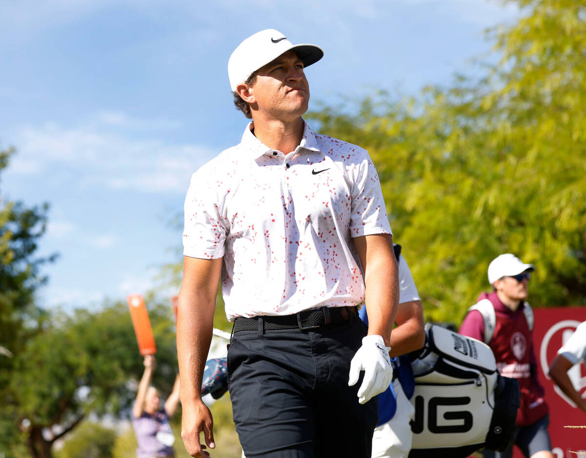 Cameron Champ walks toward the 1st hole after driving off the tee to the fairway during the sec ...