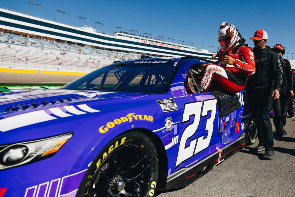 Bubba Wallace gets into his race car to practice before the NASCAR Cup Series South Point 400 o ...