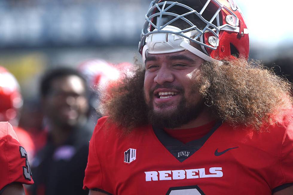 UNLV’s Naki Fahina smiles as his team takes on Nevada at Mackay Stadium in Reno on Oct. 14, 2 ...