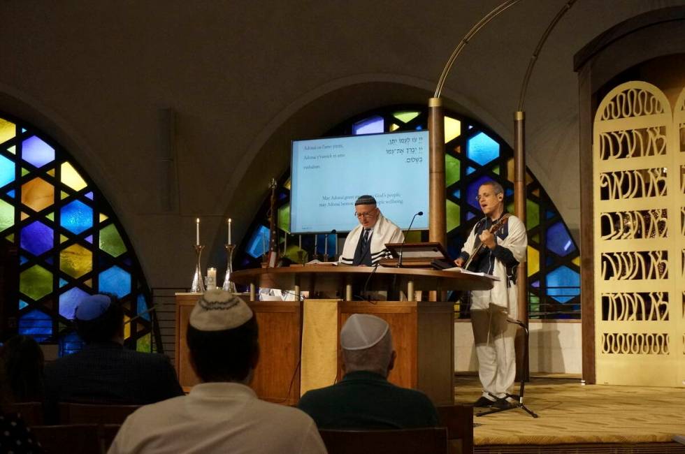 Cantor Juval Porat, right, and Rabbi Robert Davis lead Shabbat services at Temple Beth Sholom i ...