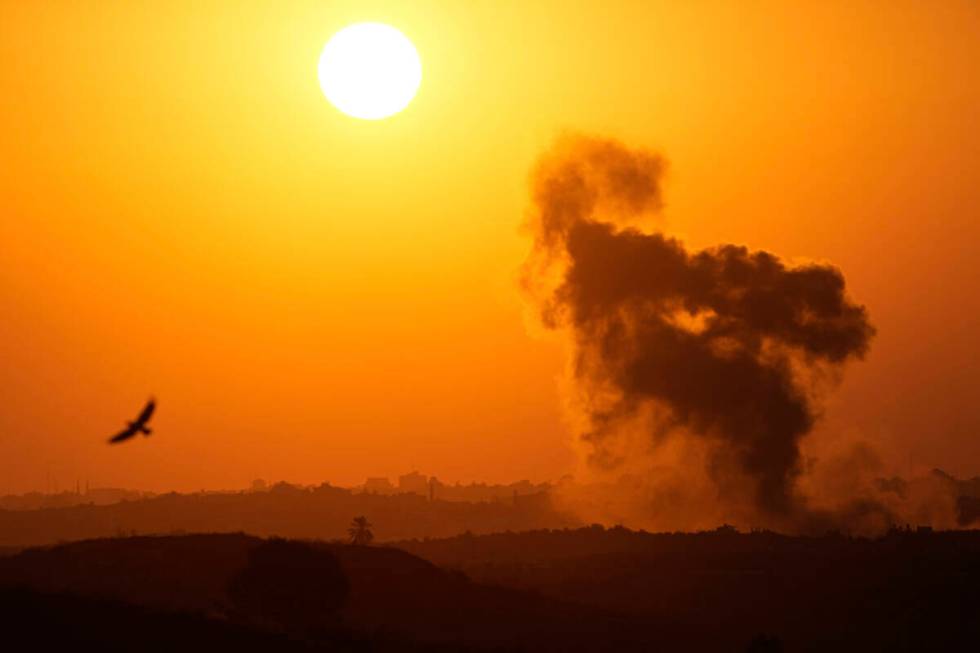 Smoke rises following an Israeli airstrike in the Gaza Strip, as seen from southern Israel, on ...