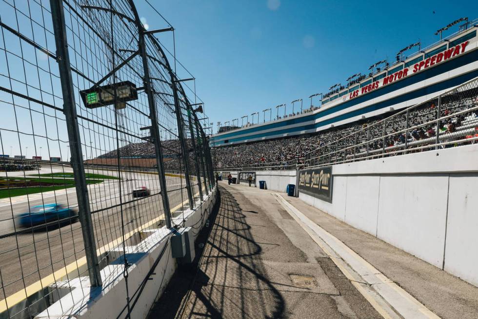 Race cars speed throughout the track during the South Point 400 at the Las Vegas Motor Speedway ...