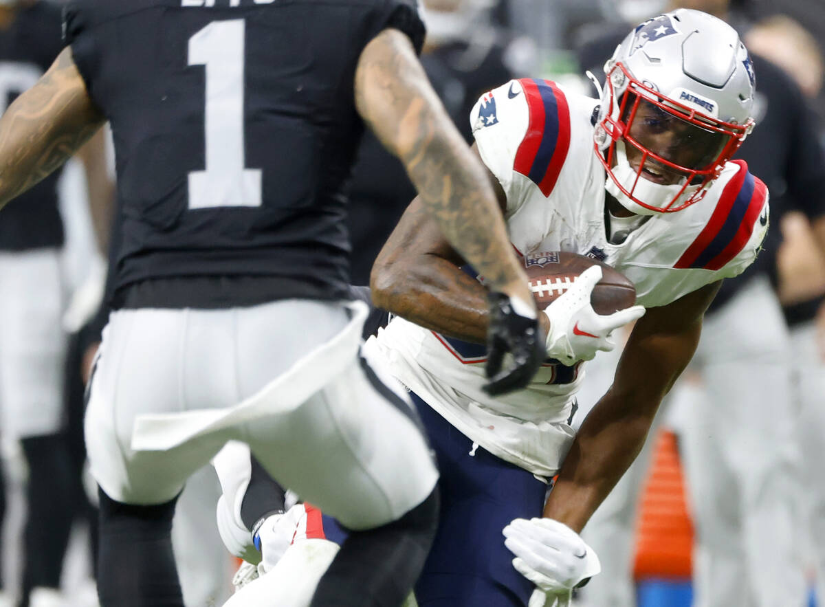 Raiders safety Marcus Epps (1) defense New England Patriots guard Andrew Stueber (64) during th ...