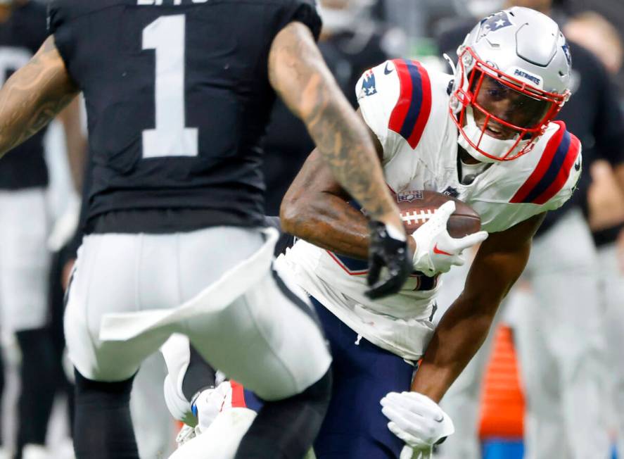 Raiders safety Marcus Epps (1) defense New England Patriots guard Andrew Stueber (64) during th ...