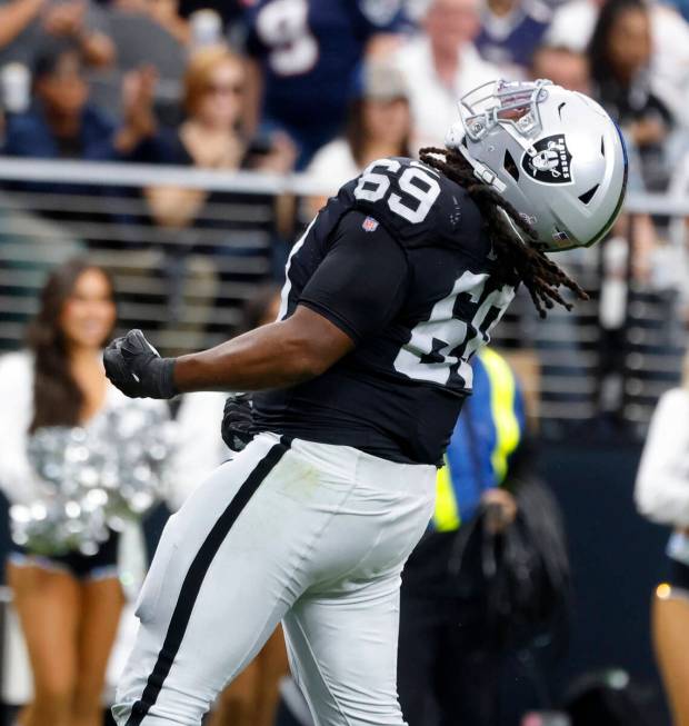 Raiders defensive tackle Adam Butler (69) reacts after sucking New England Patriots quarterback ...