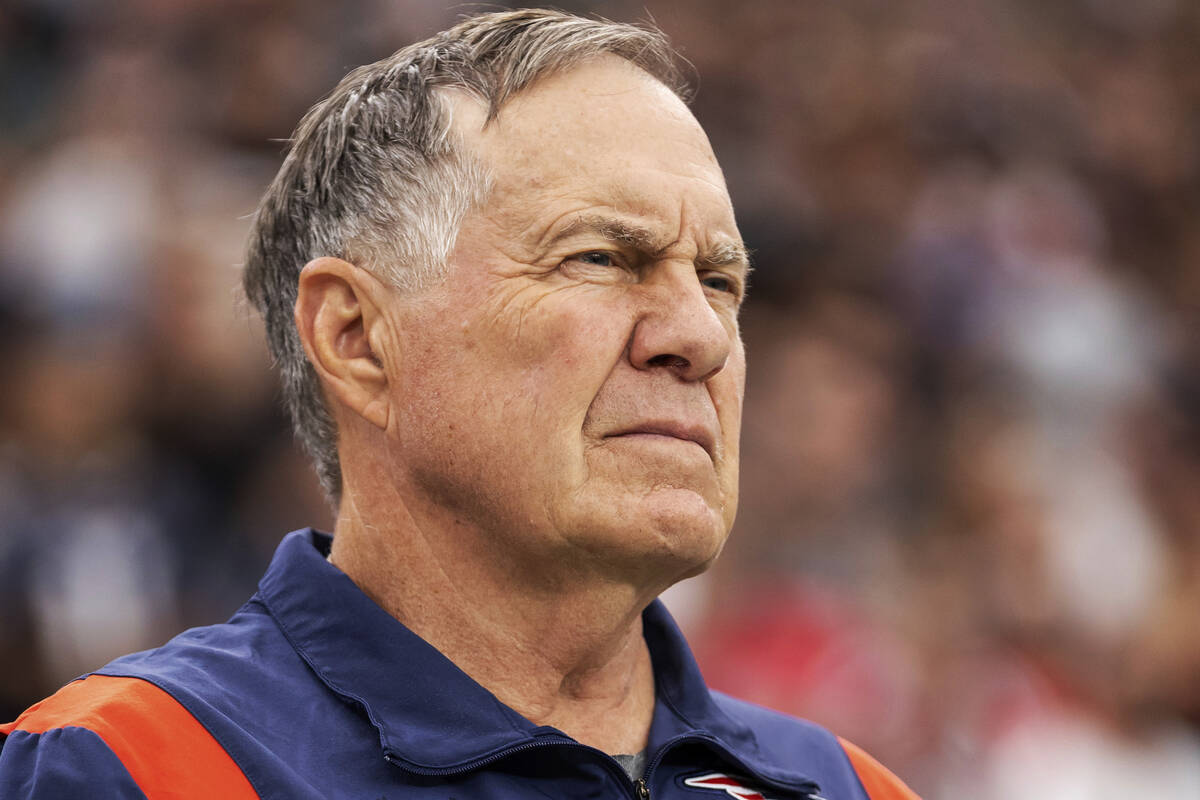 New England Patriots head coach Bill Belichick coaches against the Las Vegas Raiders in an NFL ...