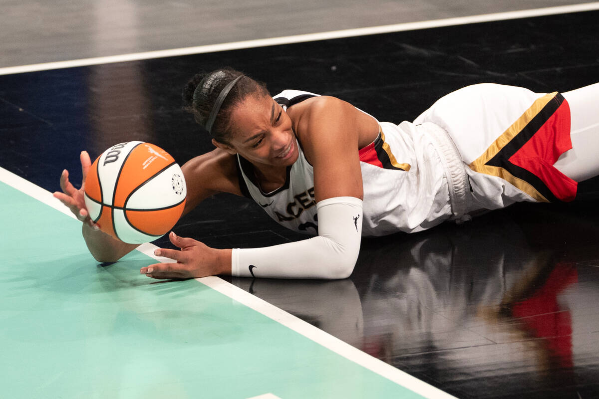 Las Vegas Aces forward A'ja Wilson (22) dives but can’t keep the ball in bounds during t ...