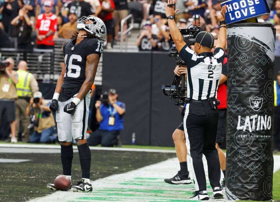 Raiders wide receiver Jakobi Meyers (16) celebrates his touchdown during the first half of an N ...