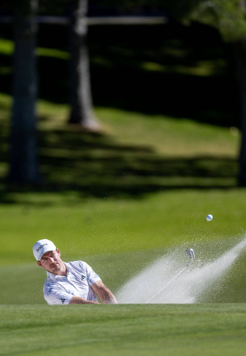 Nick Taylor wedges out of the sand trap on hole 9 during final day play at the Shriners Childre ...