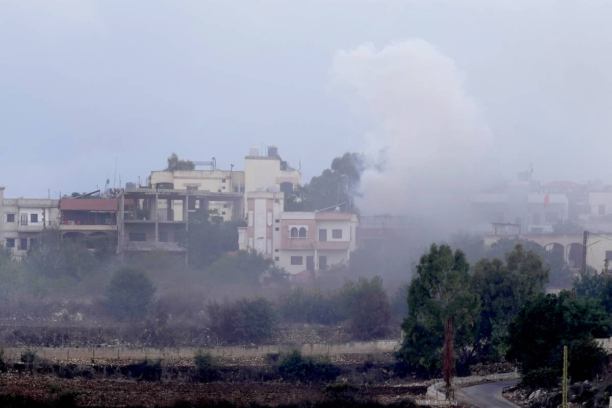 Smoke rises from artillery shell that hit the houses of Aita al-Shaab a Lebanese border village ...