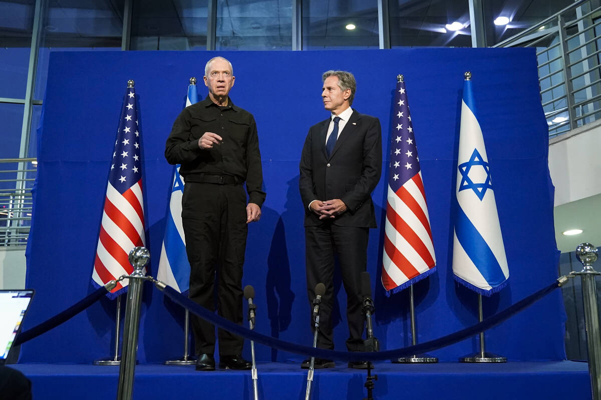 U.S. Secretary of State Antony Blinken, right, and Israeli Defense Minister Yoav Gallant make b ...