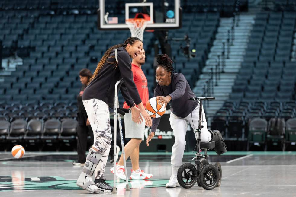 Las Vegas Aces center Kiah Stokes and guard Chelsea Gray, both injured in Game 3, fake play one ...