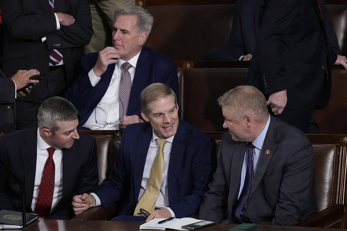 Rep. Jim Jordan, R-Ohio, chairman of the House Judiciary Committee, seated center, talks to Rep ...