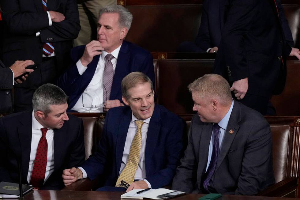 Rep. Jim Jordan, R-Ohio, chairman of the House Judiciary Committee, seated center, talks to Rep ...