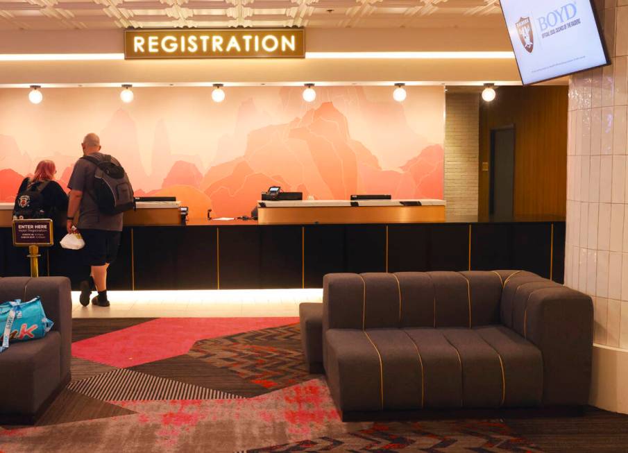 Hotel guests check in at the newly renovated Fremont's registration desk in downtown Las Vegas, ...