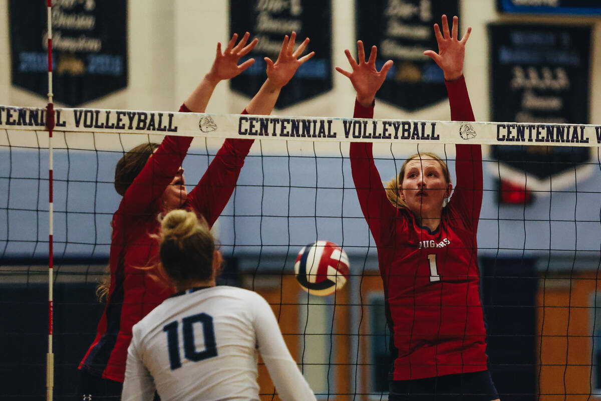 The ball escapes Coronado middle blocker Hannah Wayment (1) during a game against Centennial at ...